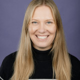 Marie Kühne Junge Frau mit breitem Lachen