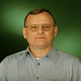 Portrait von Uwe Flüß