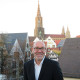 Profilbild Uwe Hoffmann mit Blick auf die Ulmer Altstadt