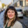 Charlotte Schmitz Ein Foto von der Kandidatin Charlotte Schmitz, auf dem ihr Gesicht und Teile des Oberkörpers zusehen sind mit einer Straße im Hintergrund